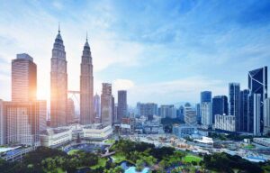 Malaysia to ease mask mandate and lift more Covid curbs