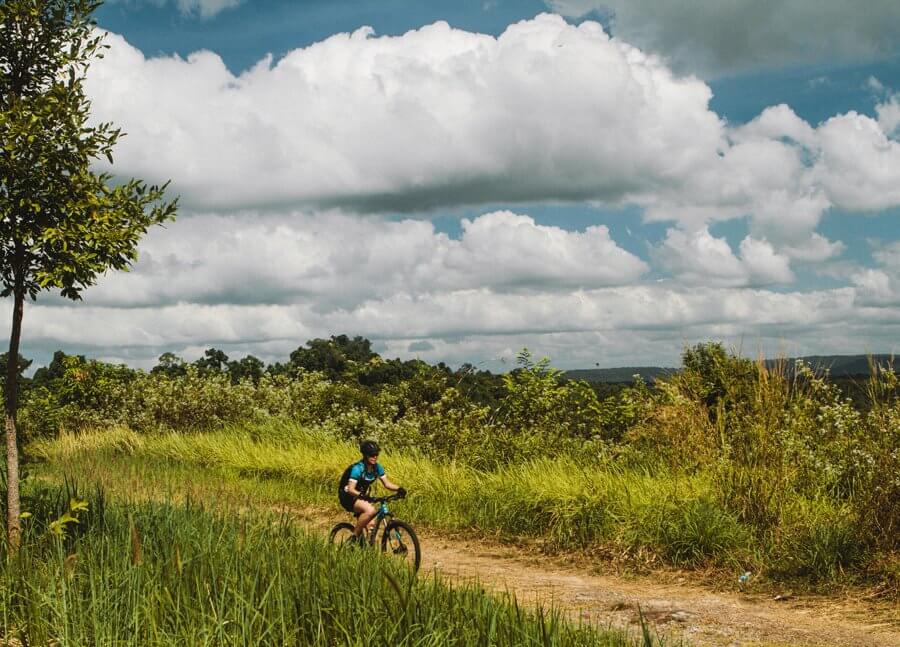 Cycling in Country Fields Cambodia