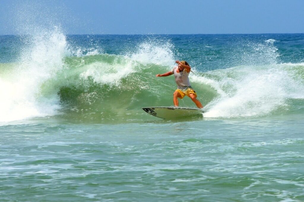 Surf the Tidal Waves Kovalam Kerala