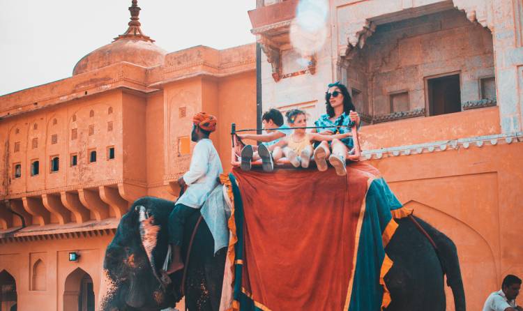 Elephant ride at Amer Fort during Jaipur sightseeing on 7 Days Golden Triangle Tour with Tusk Travel.