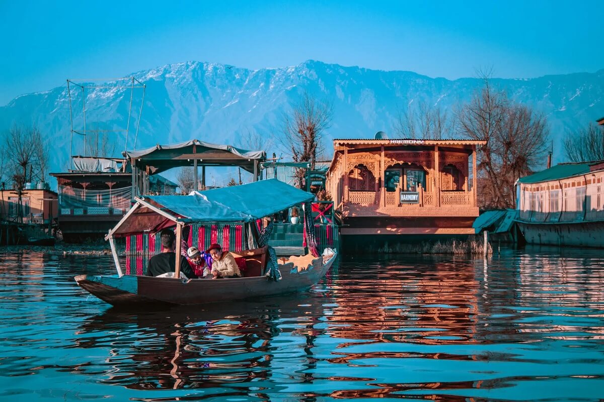 Nigeen Lake Srinagar with calm water, houseboats, shikaras and mountain views