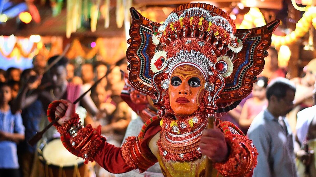 Theyyam costume portrait and village photography Kerala