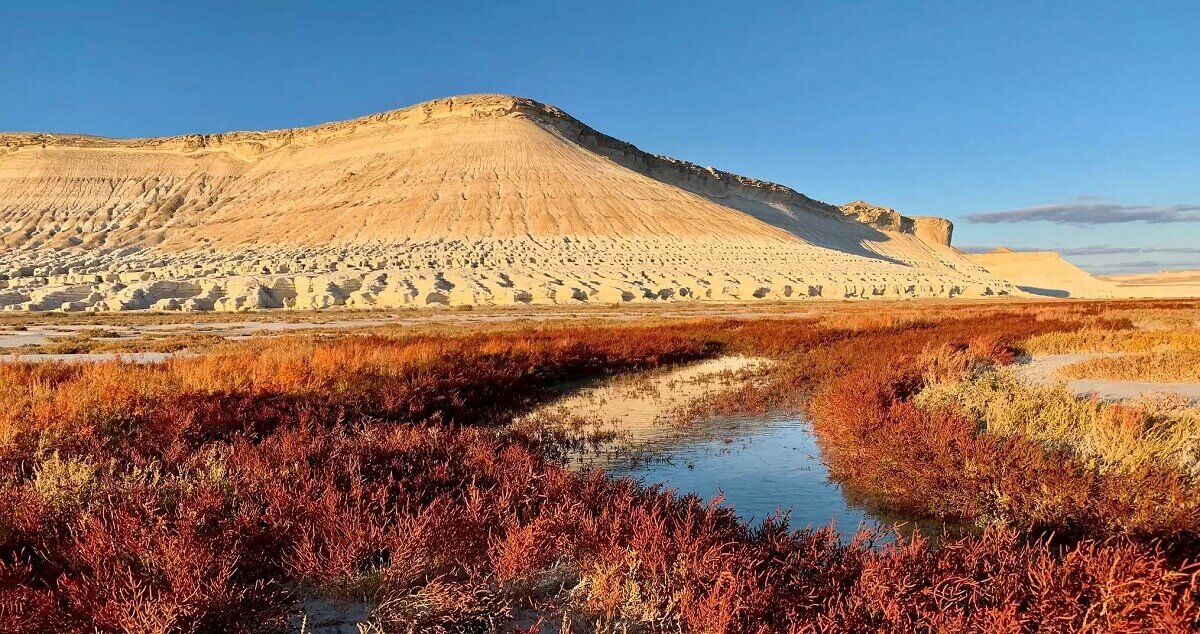 Kazakhstan adventure tours with canyons, lakes and mountain landscapes